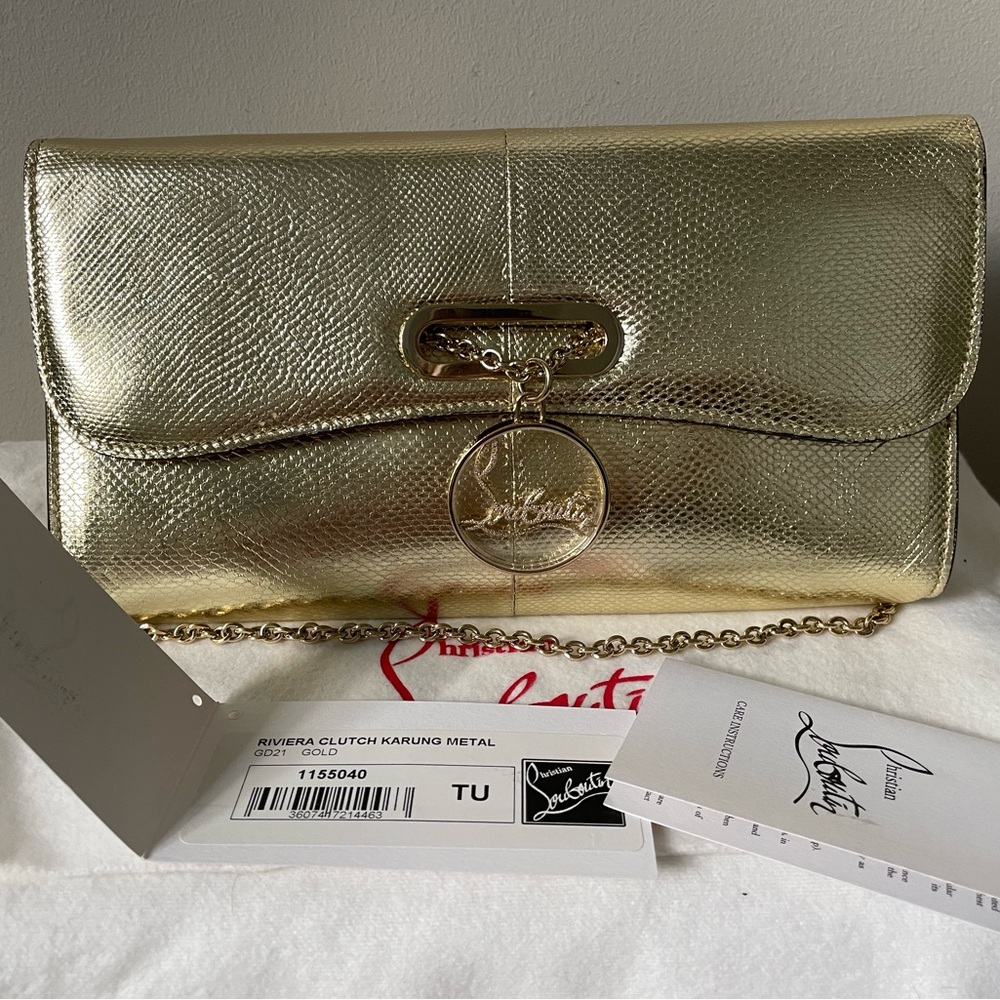 CHRISTIAN LOUBOUTIN
Riviera Metallic Snake-Embossed Clutch